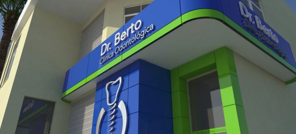 Fachada da Dr. Berto Clínica Odontológica com letreiro branco em fundo azul.