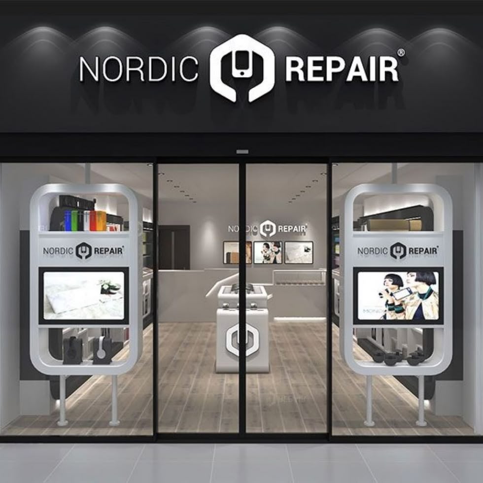 Loja Nordic Repair com design moderno e logotipo de chave inglesa.